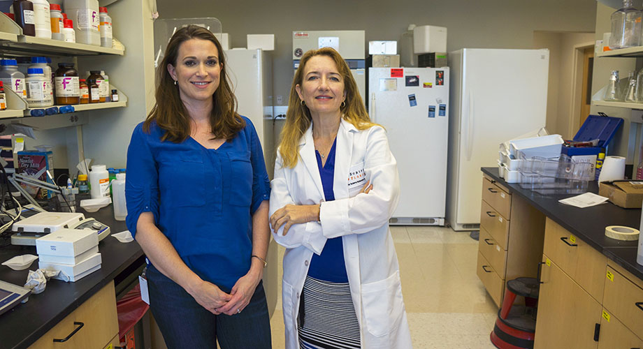 Left to right: Study first author Cullen Schmid, staff scientist, and TSRI Professor Laura Bohn (Photo courtesy Laura Bohn)